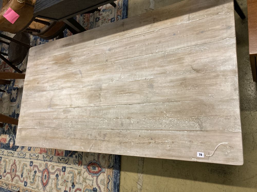 A rectangular limed oak coffee table, width 170cm, depth 88cm, height 40cm